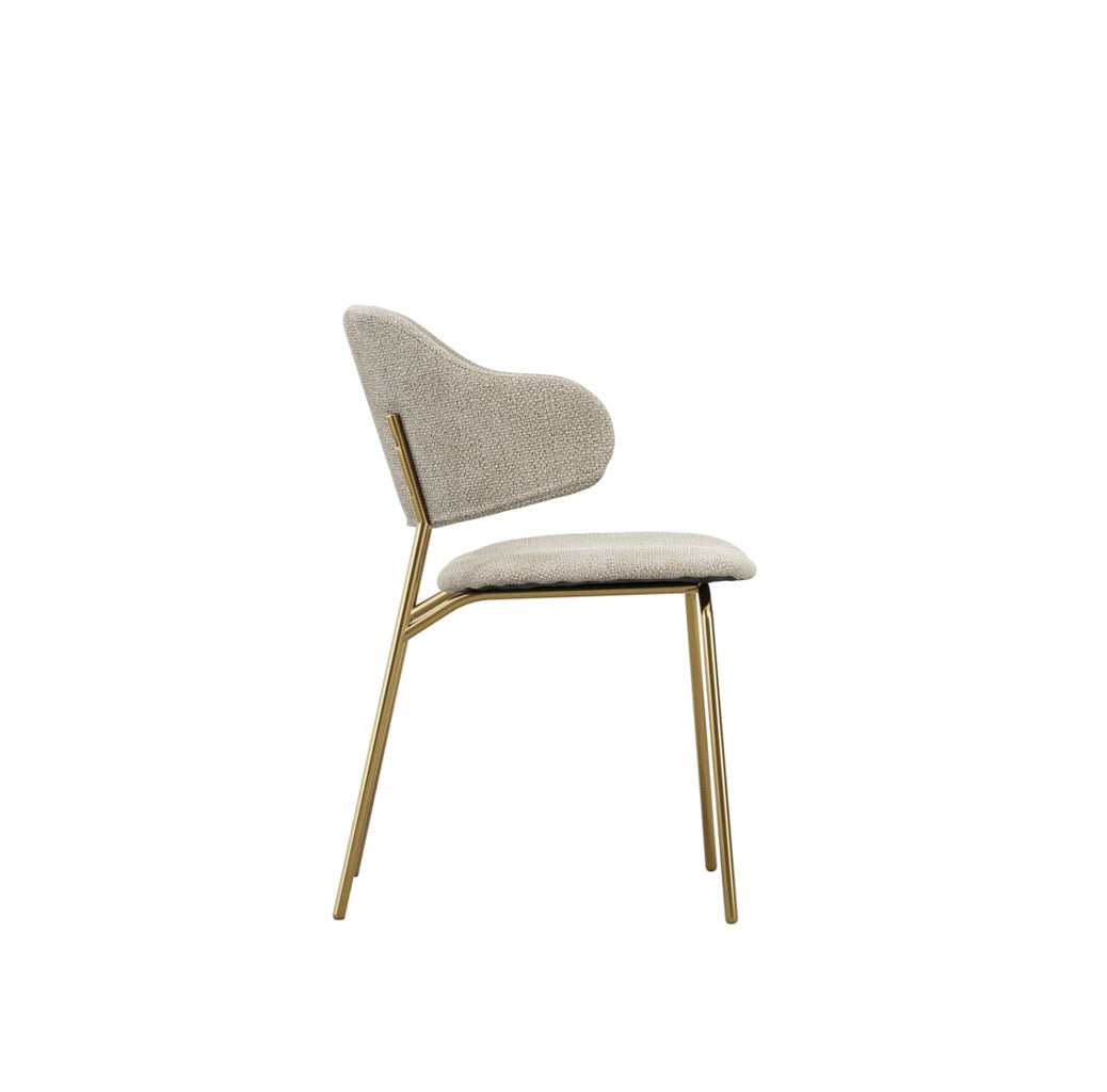 	LPD Furniture Dorchester wheat weave dining chair with brushed gold legs in a modern dining setting