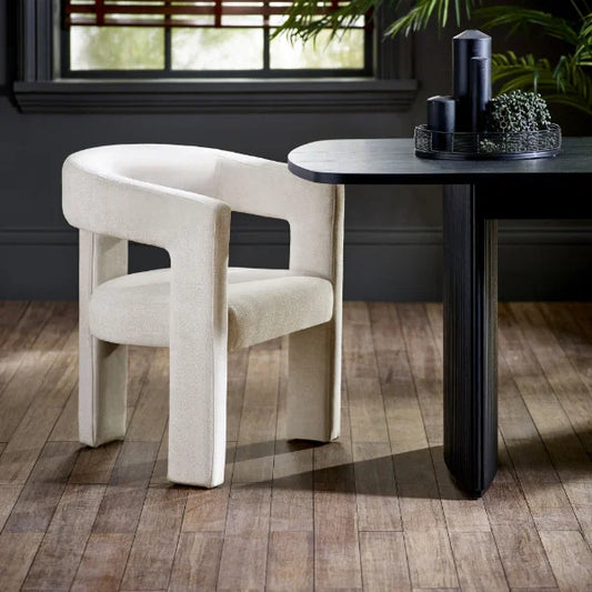 Elara cream chenille chair in a modern dining or living room setting