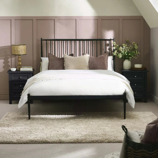 Floyd black metal spindle bed in a modern bedroom setting