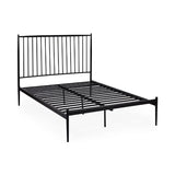 Floyd black metal spindle bed in a modern bedroom setting