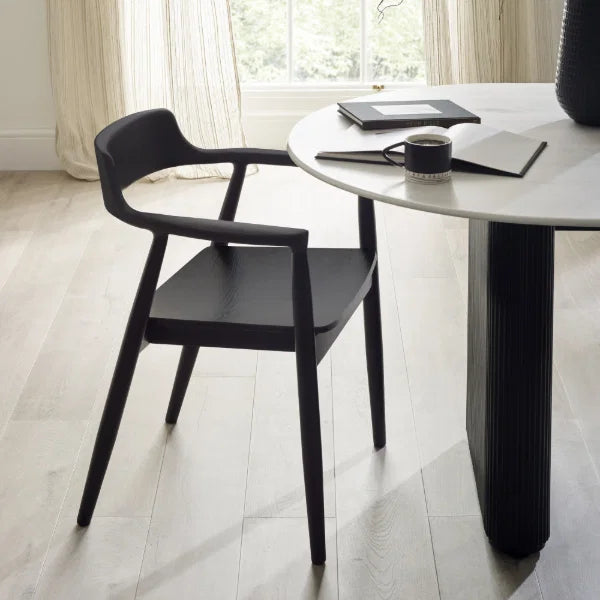 Franklin set of 2 black dining armchairs in a modern dining room setting