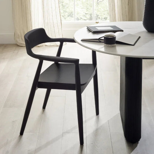 Franklin set of 2 black dining armchairs in a modern dining room setting