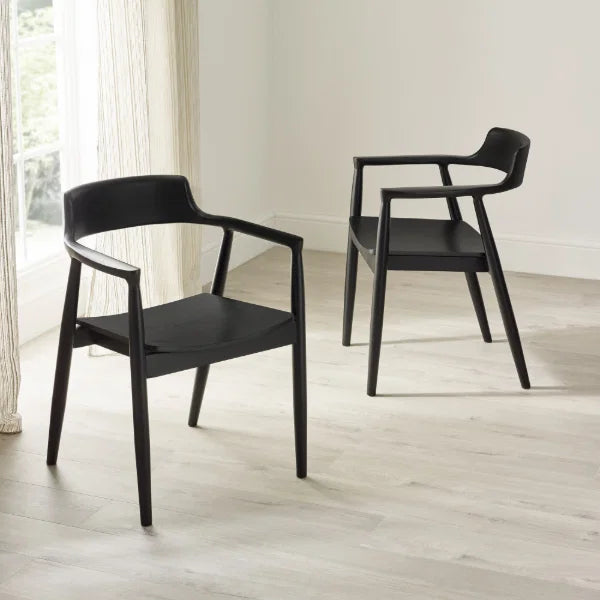 Franklin set of 2 black dining armchairs in a modern dining room setting