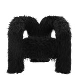 LPD Furniture Freyja jet black faux Mongolian fur extra-large accent chair with curved three-leg base in a modern living room setting