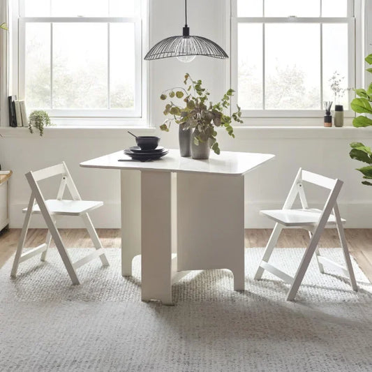 Gatan white gateleg table with 2 chairs in a compact kitchen or dining setting