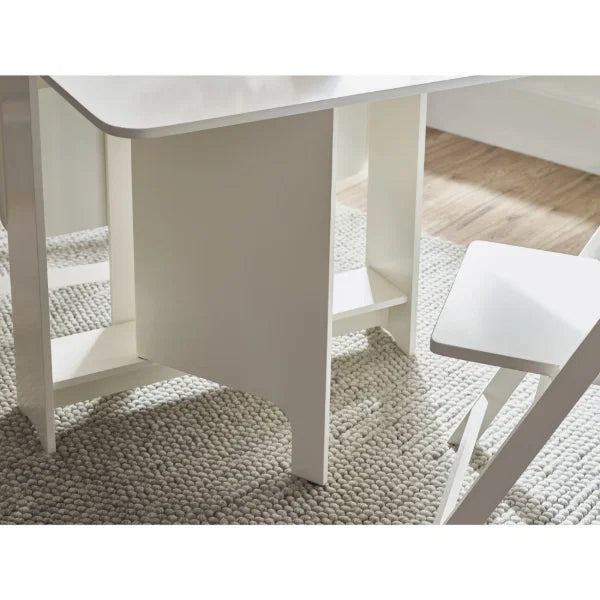 Gatan white gateleg table with 2 chairs in a compact kitchen or dining setting