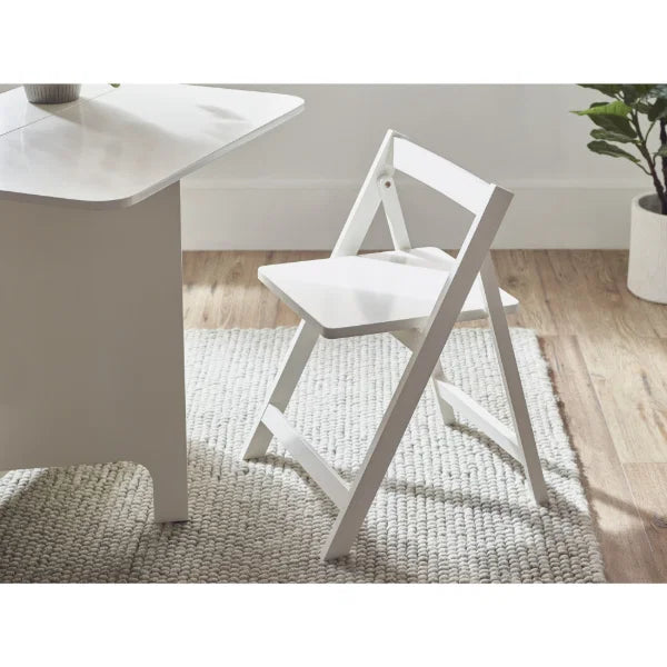 Gatan white gateleg table with 2 chairs in a compact kitchen or dining setting