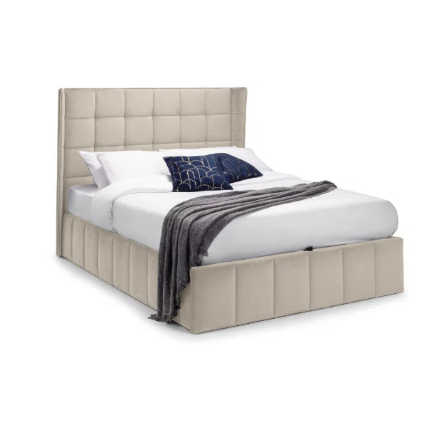 Gatsby cream velvet ottoman bed with tall winged headboard in a modern bedroom setting