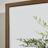 	Julian Bowen Hampshire walnut mirrored bathroom wall cabinet in a modern bathroom setting