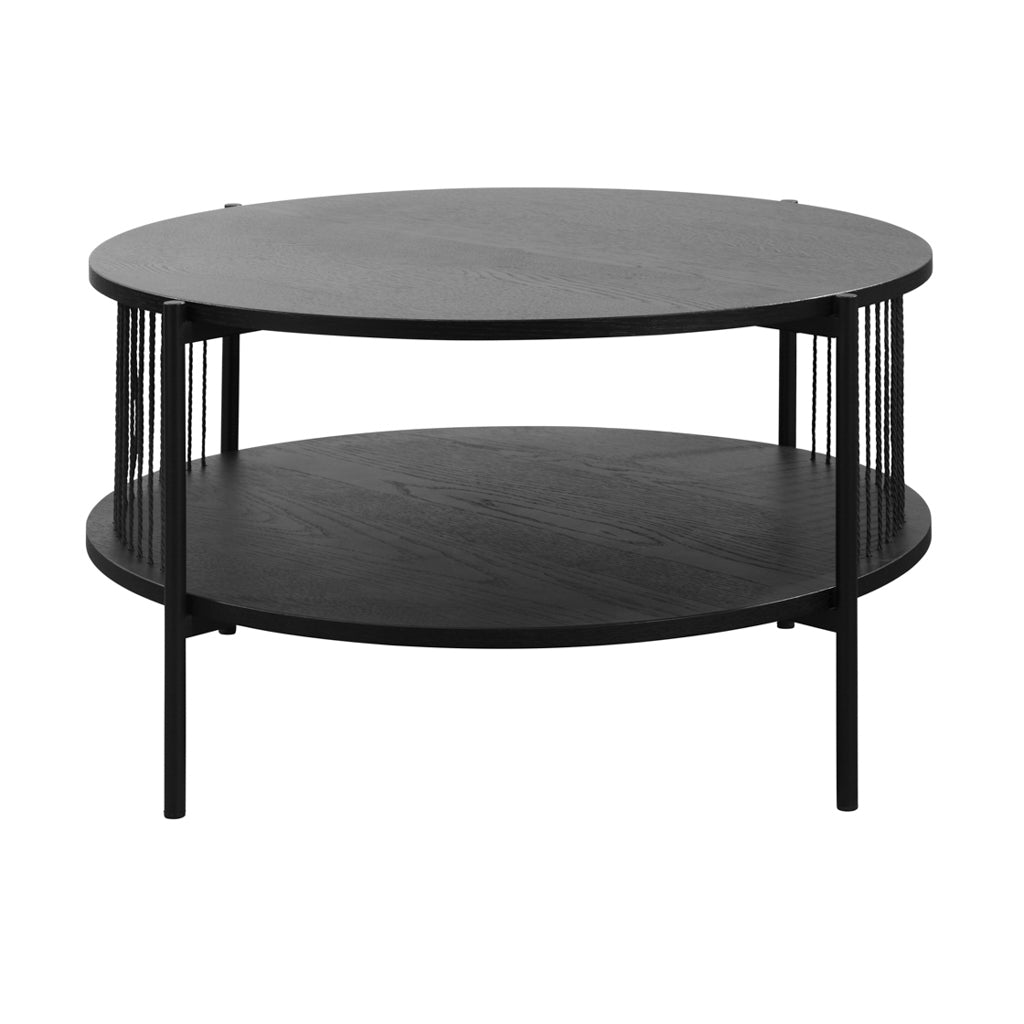 LPD Furniture Harper black matte coffee table with curved design and hidden storage in a modern living room setting