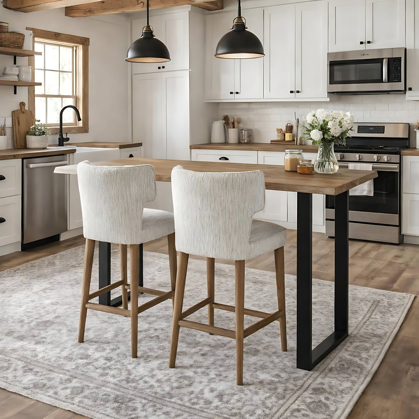 	Hill Interiors Avia mist grey fabric barstool with wooden frame, placed in a modern kitchen setting