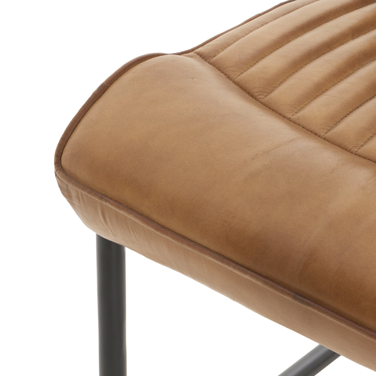 	Hill Interiors Billy leather dining chair from behind showing the black metal frame and channeled backrest