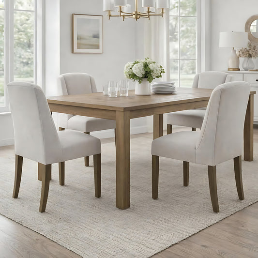 Hill Interiors Compton Aspen neutral twill dining chair with wooden frame and curved backrest, placed in an elegant dining setting