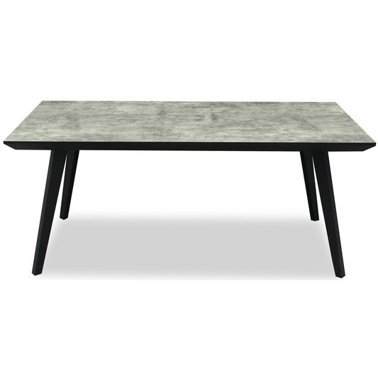 	Hill Interiors Nivara rectangular dining table with wooden top and black base, placed in a modern dining setting