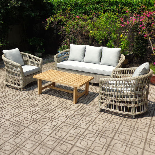 	Hill Interiors Palma Collection beige outdoor set in a modern garden setting