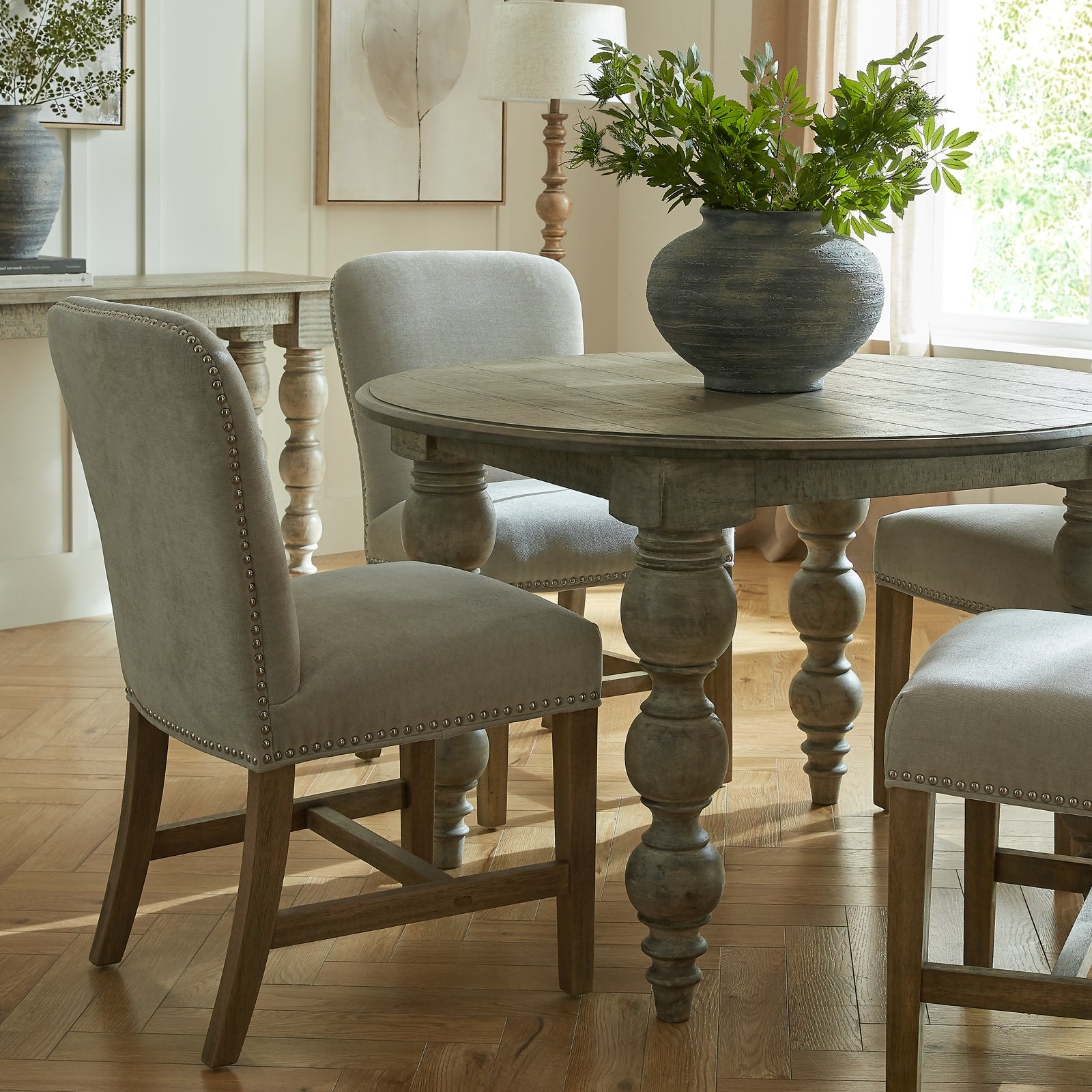 Hill Interiors Rutland Collection round table styled with fine tableware and centrepiece