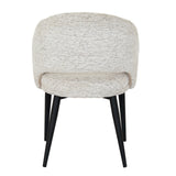 Hill Interiors Sorelle curved white dining chair styled with modern tableware on a dining table