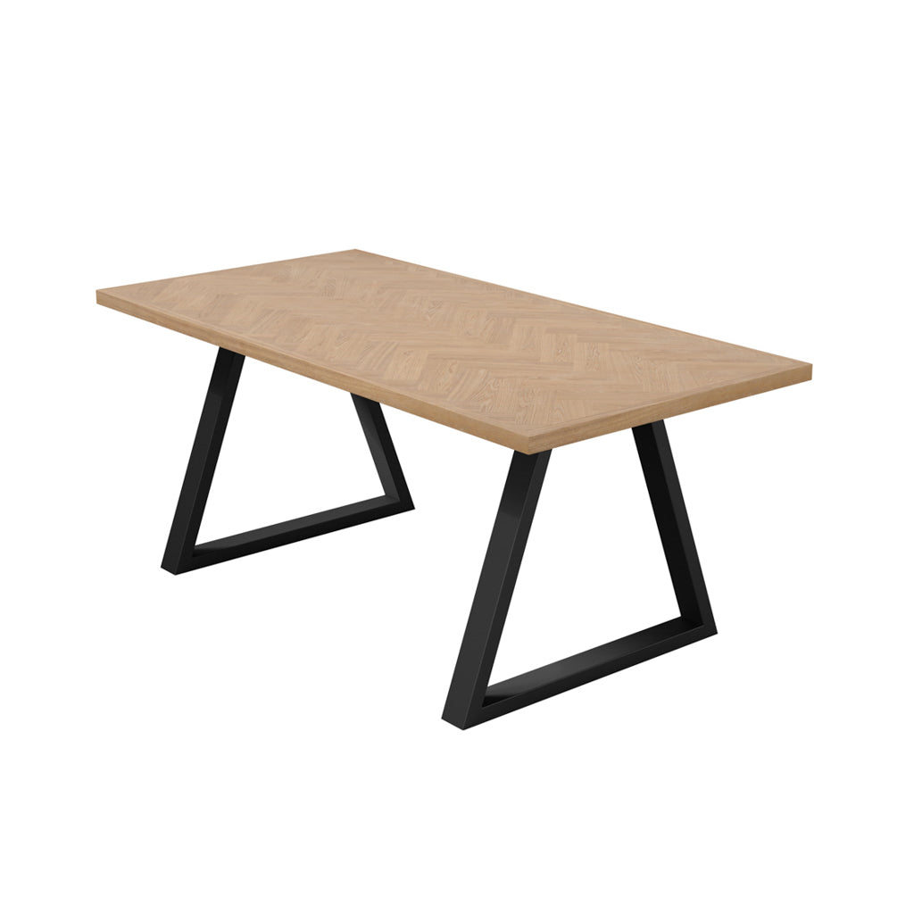 LPD Furniture Hyde natural wood herringbone dining table with black metal legs in a modern dining setting