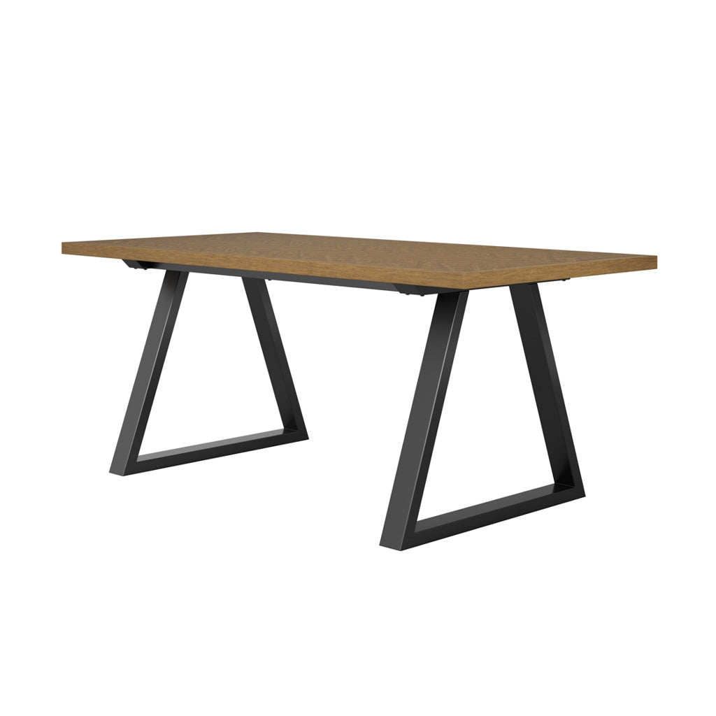LPD Furniture Hyde whiskey wood herringbone dining table with black metal legs in a modern dining setting