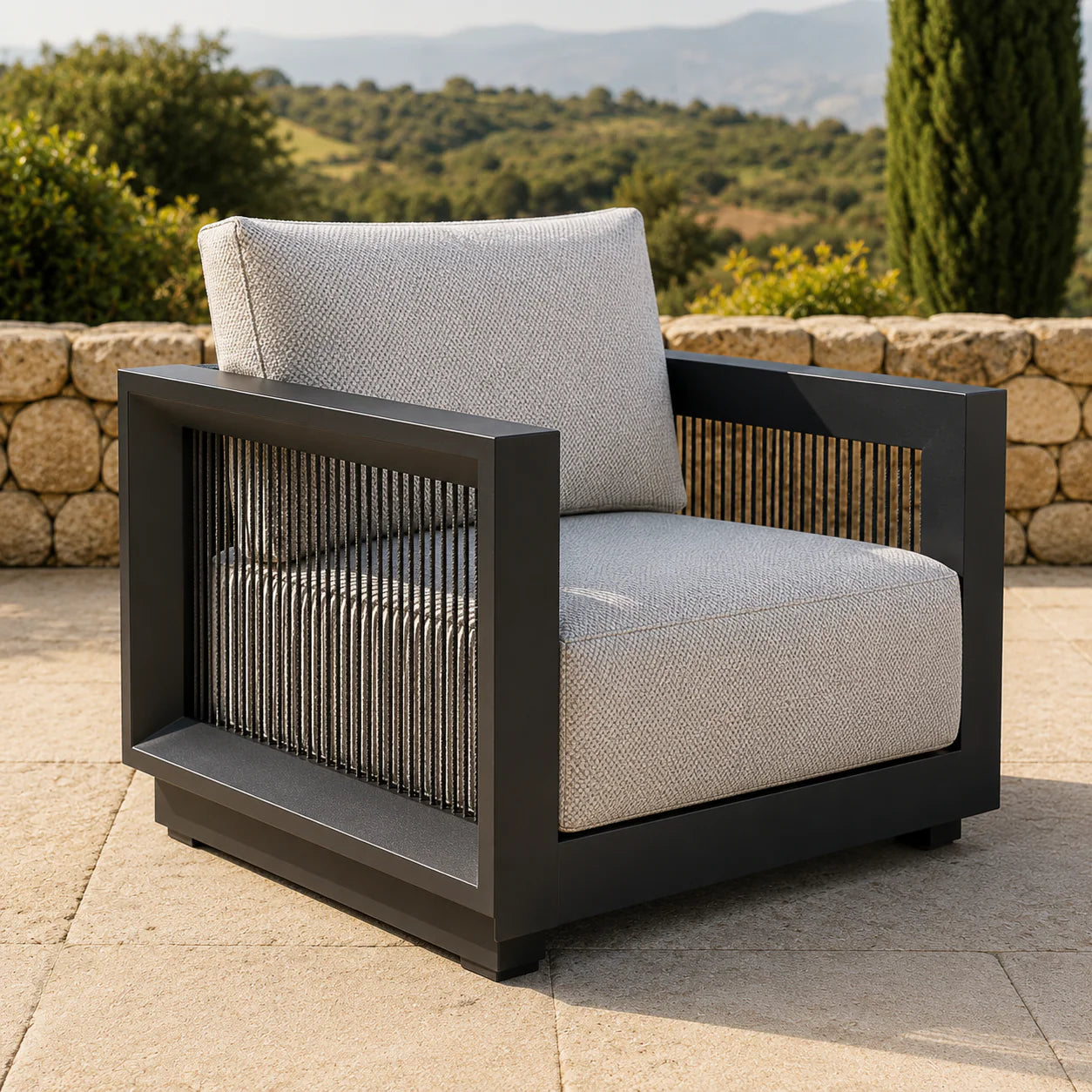 Furnish365 Ikos 5 seater outdoor lounge set with polyrattan wicker and aluminium frame in a modern garden setting