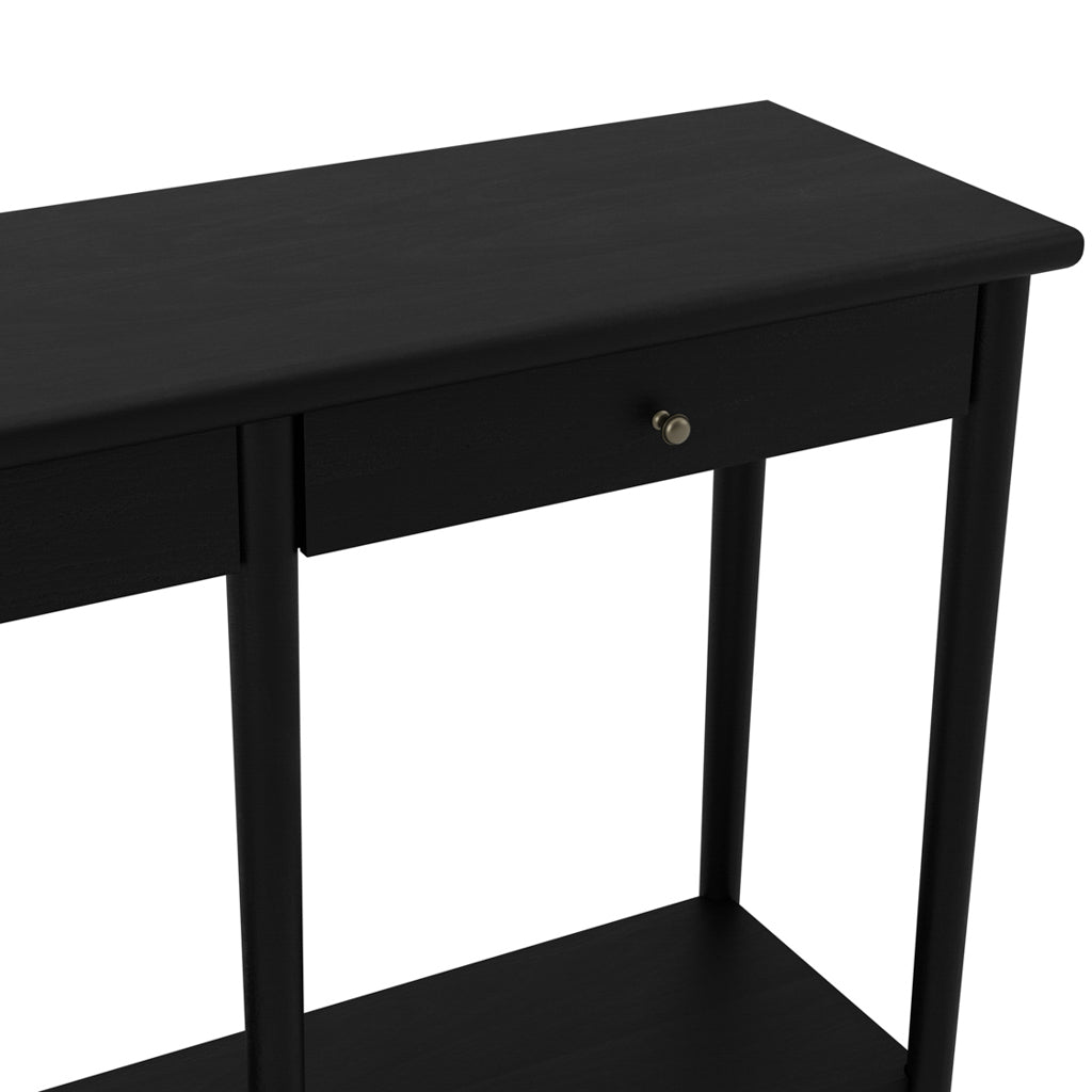 LPD Furniture Jackson matte black console table with antique brass handles in a modern hallway setting