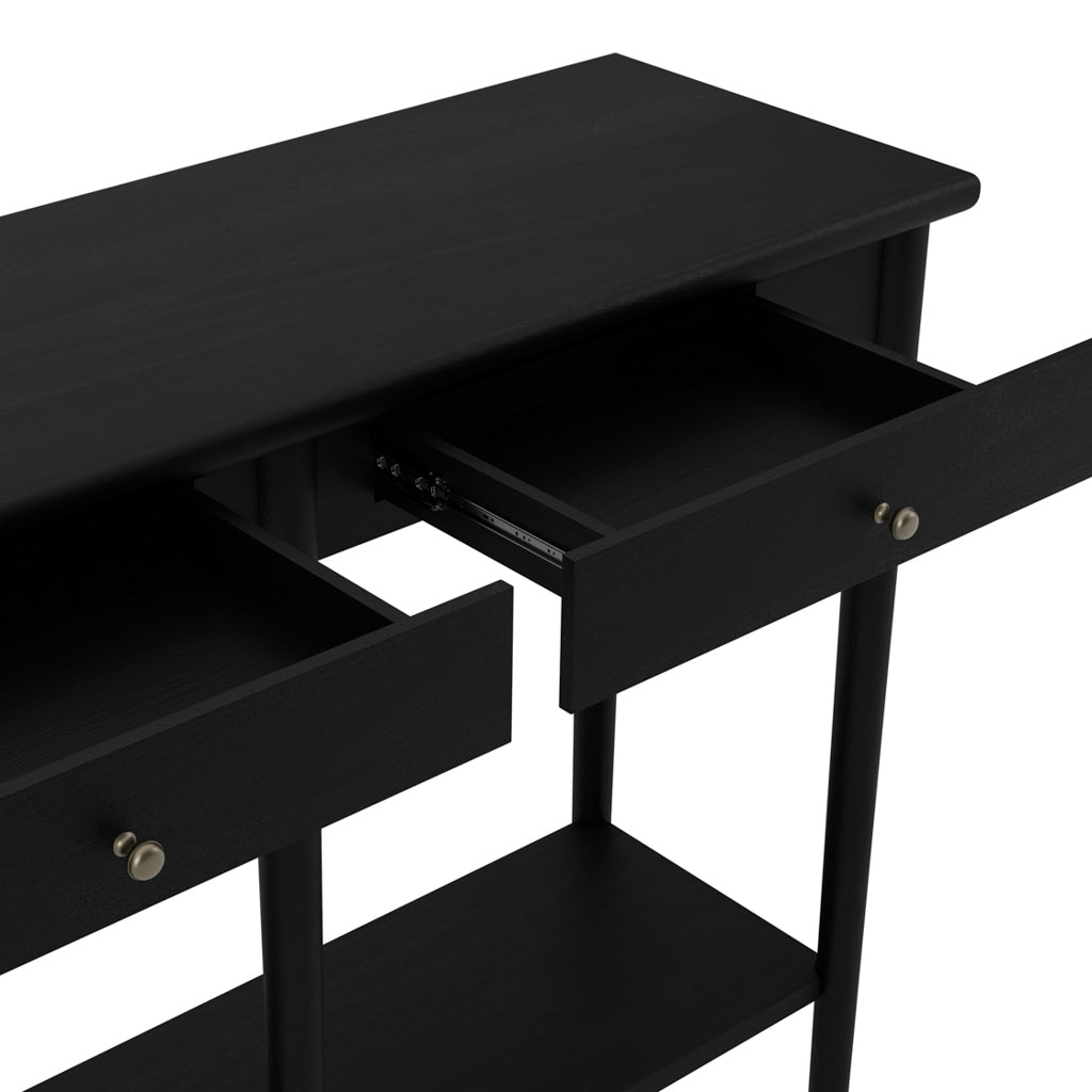 LPD Furniture Jackson matte black console table with antique brass handles in a modern hallway setting