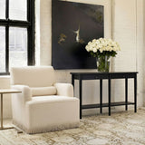 	LPD Furniture Josephine crema fabric armchair with fringe trim and bolster cushion in a classic living room setting