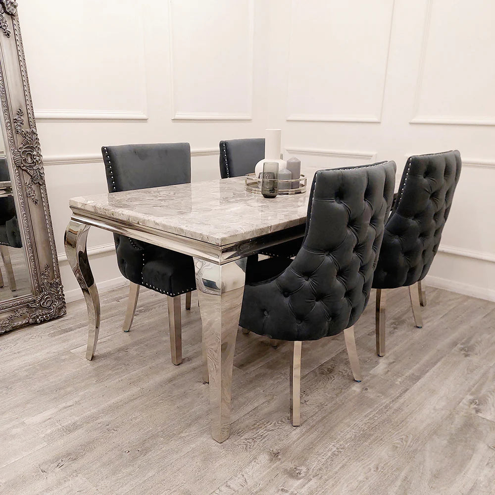 Furnish365 Kensington dark grey velvet dining chair with deep buttoned back and chrome studs in a modern dining setting
