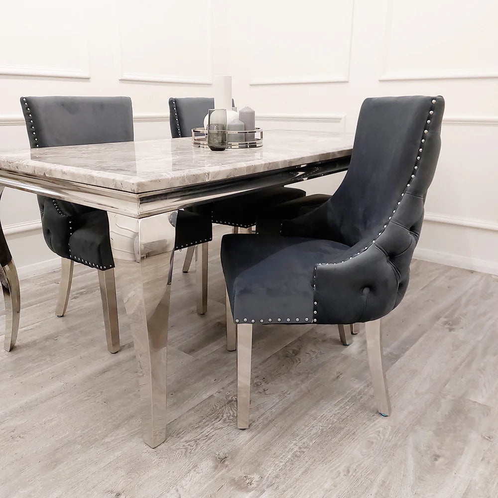 Furnish365 Kensington dark grey velvet dining chair with deep buttoned back and chrome studs in a modern dining setting
