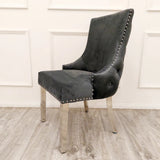 Furnish365 Kensington dark grey velvet dining chair with deep buttoned back and chrome studs in a modern dining setting
