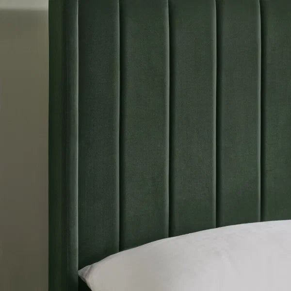 Leila bottle green double bed with vertical panelled headboard in a modern bedroom setting