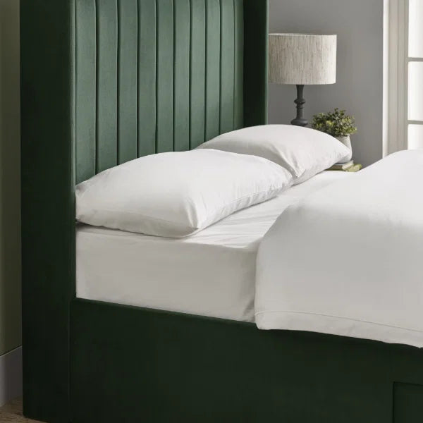 Leila bottle green double bed with vertical panelled headboard in a modern bedroom setting