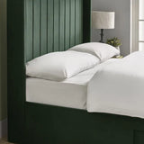 Leila bottle green double bed with vertical panelled headboard in a modern bedroom setting