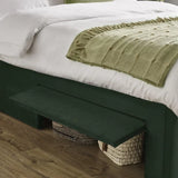 Leila bottle green king bed with vertical panelled headboard in a modern bedroom setting