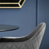 Lima set of 2 grey velvet dining chairs with diamond stitching in a modern dining room setting