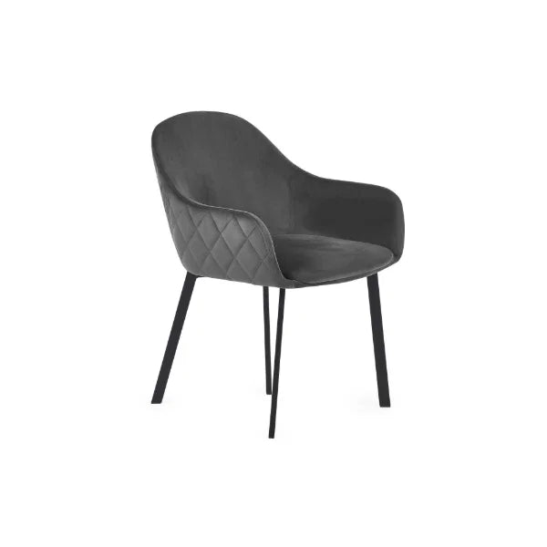 Lima set of 2 grey velvet dining chairs with diamond stitching in a modern dining room setting