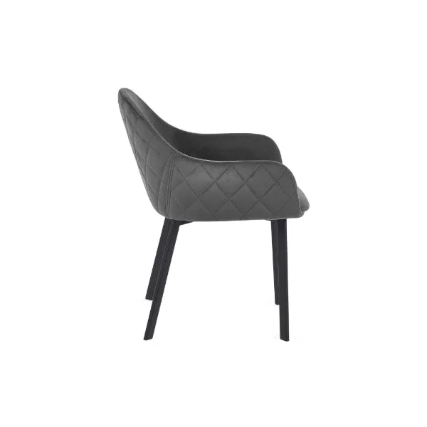 Lima set of 2 grey velvet dining chairs with diamond stitching in a modern dining room setting