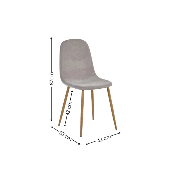 Lottie set of 4 linen chenille dining chairs in a modern dining room setting