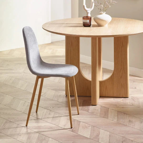 Lottie set of 4 linen chenille dining chairs in a modern dining room setting