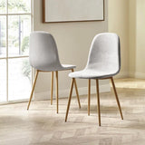 Lottie set of 4 linen chenille dining chairs in a modern dining room setting