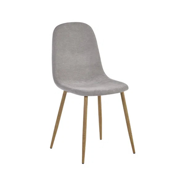 Lottie set of 4 linen chenille dining chairs in a modern dining room setting