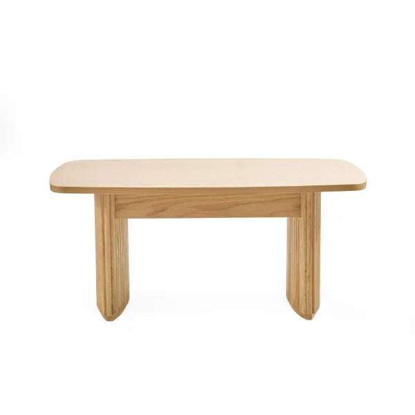 Louis fluted light oak compact coffee table in a modern living room setting