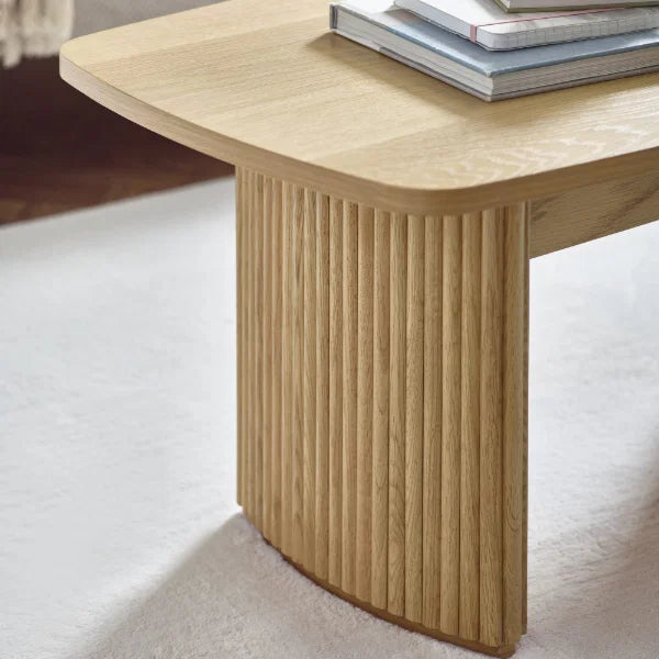 Louis fluted light oak compact coffee table in a modern living room setting