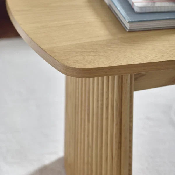 Louis fluted light oak compact coffee table in a modern living room setting