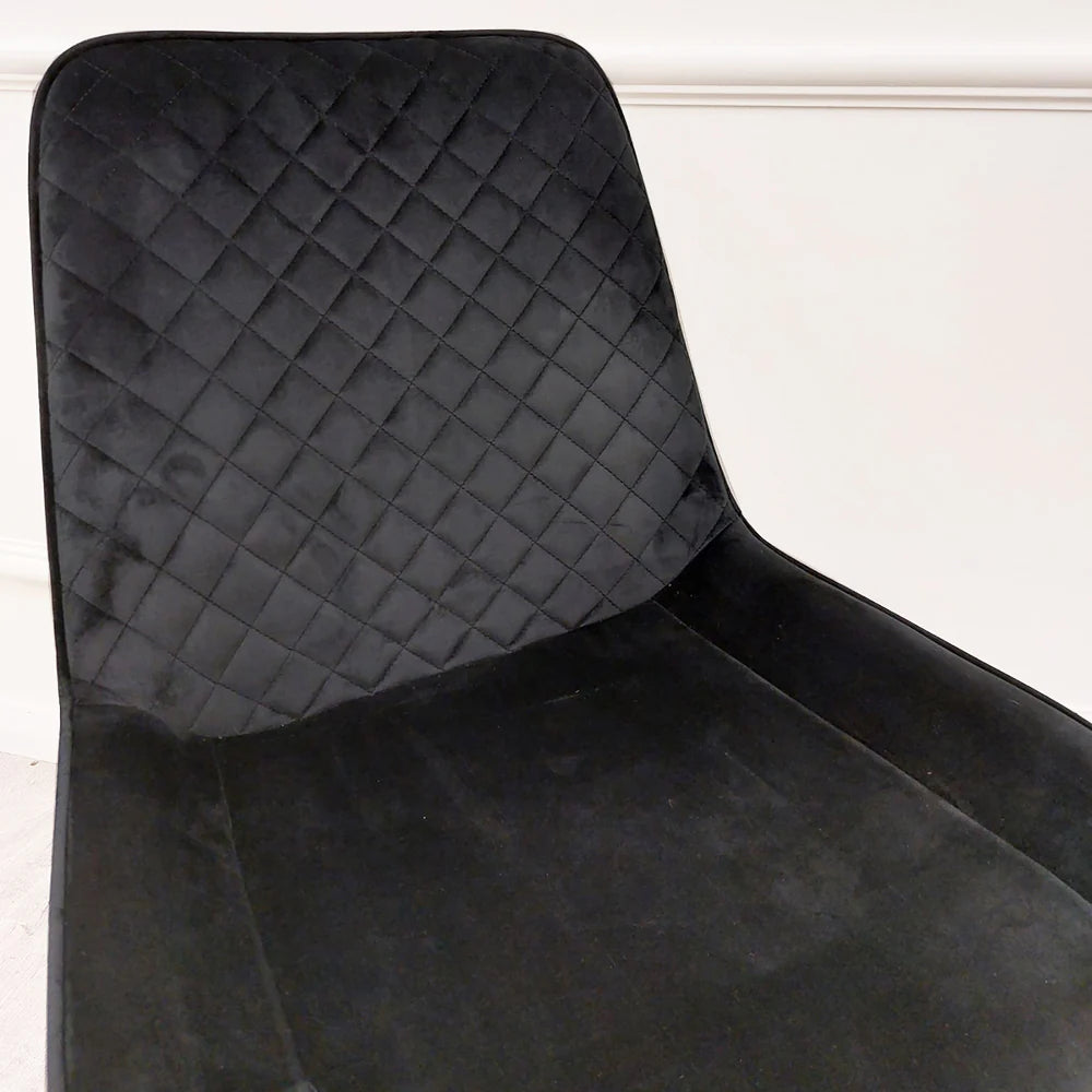 Furnish365 Luna black velvet dining chair in Scandinavian style with cross stitch back detail and gold tipped legs