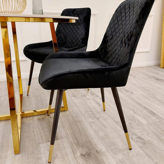 Furnish365 Luna black velvet dining chair in Scandinavian style with cross stitch back detail and gold tipped legs