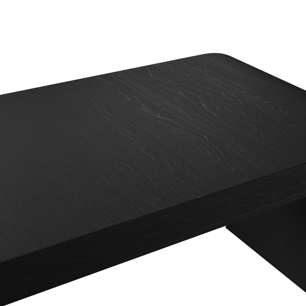 LPD Furniture Lake black coffee table with sleek curved design in a modern living room setting