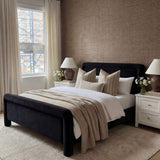 LPD Furniture Leonnie black upholstered king size bed in a modern bedroom setting