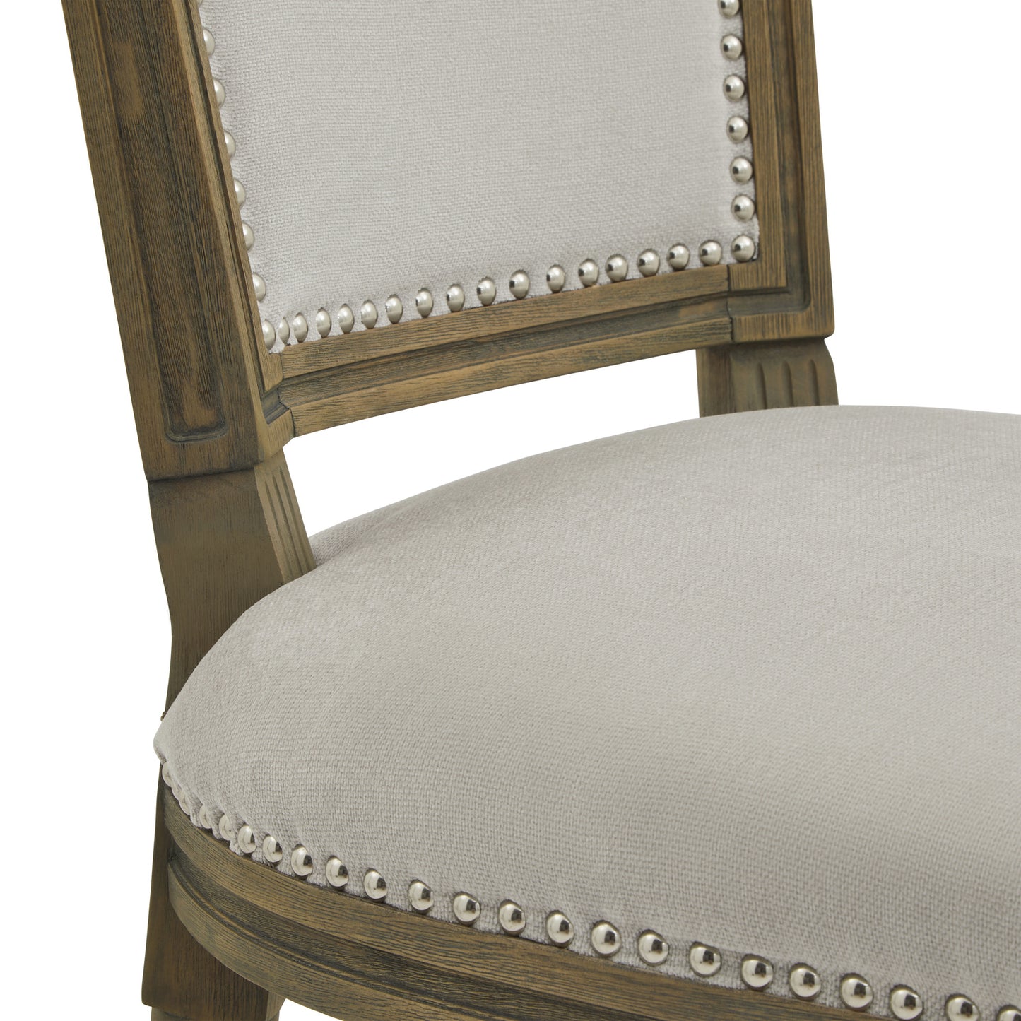 	Lifestyle view of Hill Interiors Ripley grey dining chair in an elegant dining space with natural light