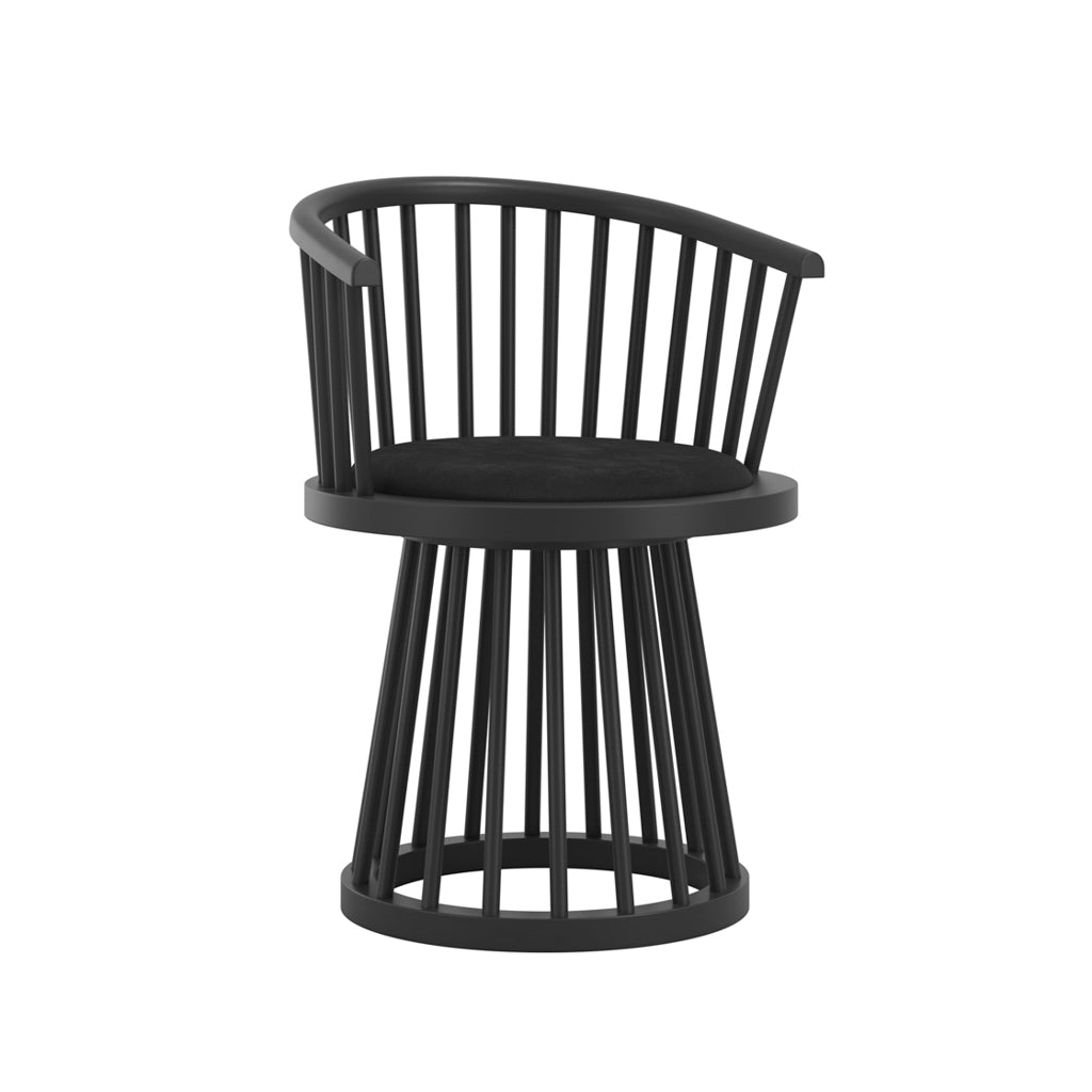 LPD Furniture Lina black velvet dining chair with curved spindle back and black satin wood frame in a modern dining setting
